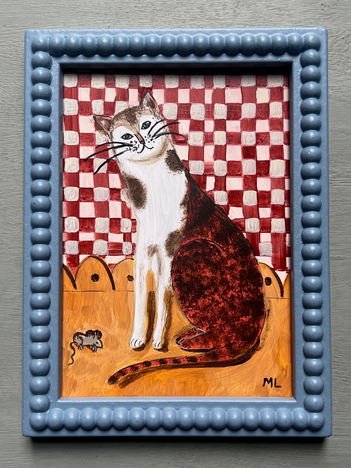 Original acrylic painting of a smiling cat sitting beside a tiny mouse against a red gingham background, painted on wooden board in a whimsical folk-art style.