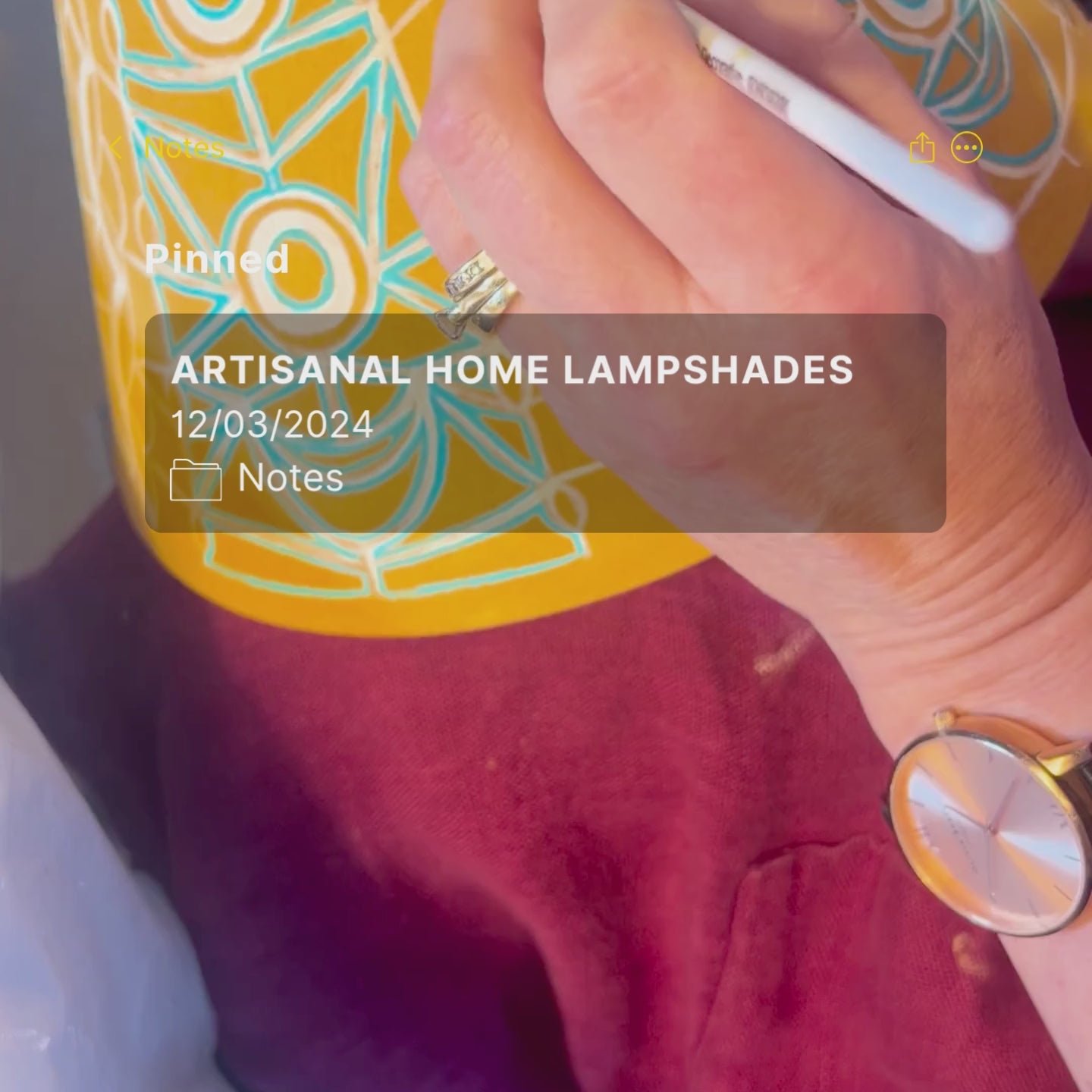 Load video: video showing melanie lewis hand painting artisanal lampshades featuring bloomsbury style designs influenced by folk art, designed for english country house interiors, commissions available on request.